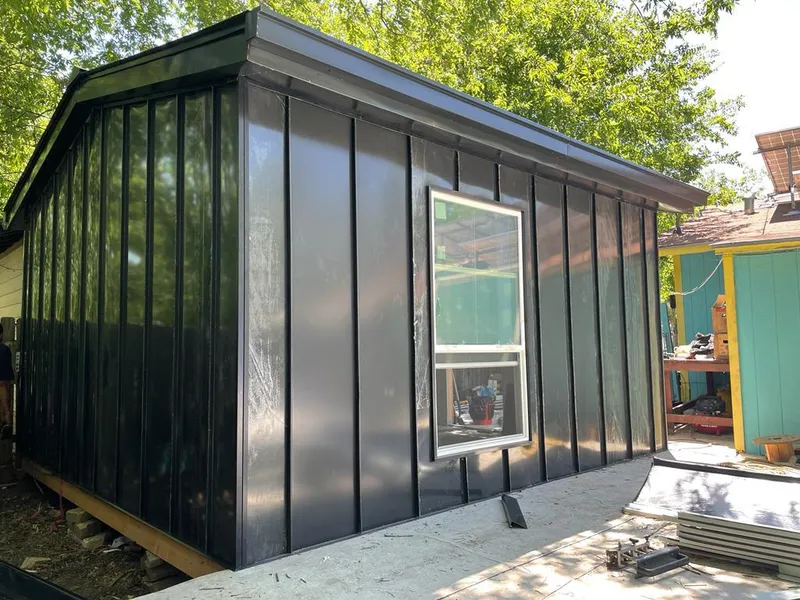 Black standing seam metal wall panels for Roof Inspection in Milford